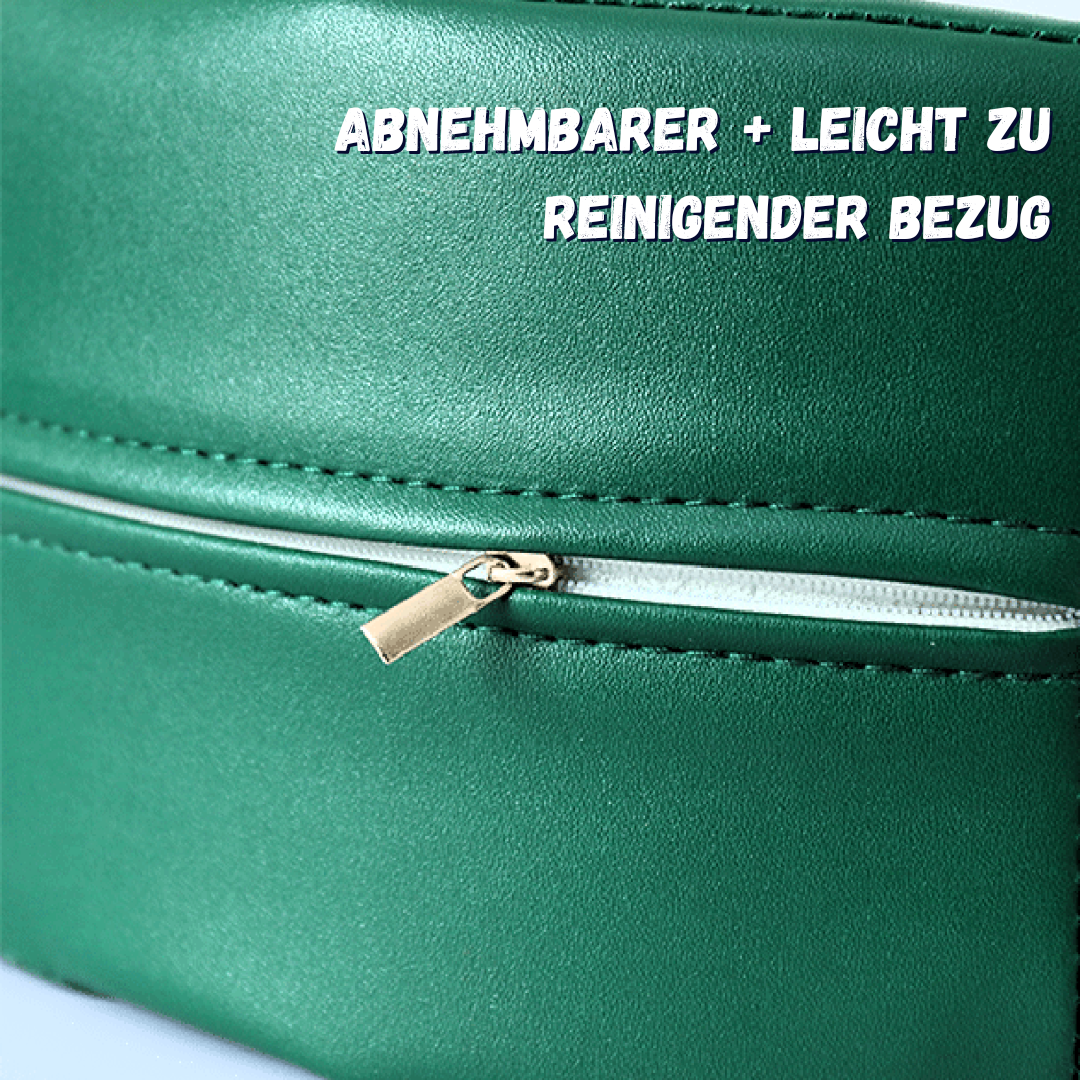 Nahaufnahme eines grünen, abnehmbaren Bezugs mit Reißverschluss, der leicht zu reinigen ist.